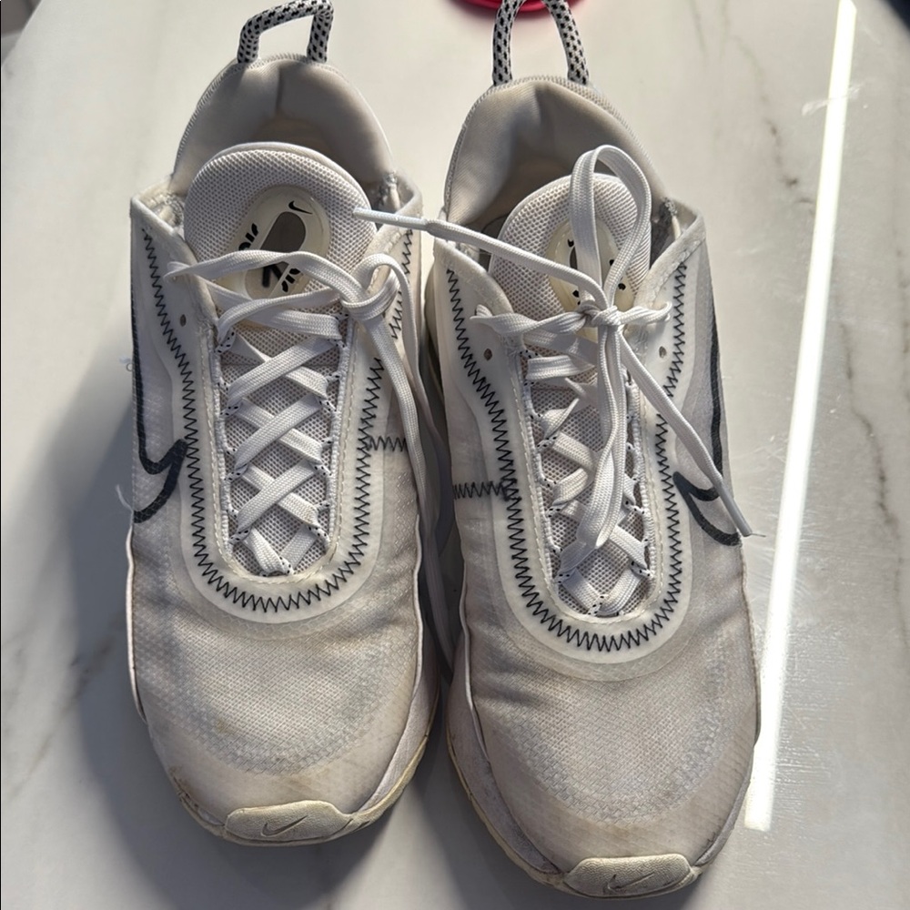 Nike White Sneakers with Cushioned Midsole
